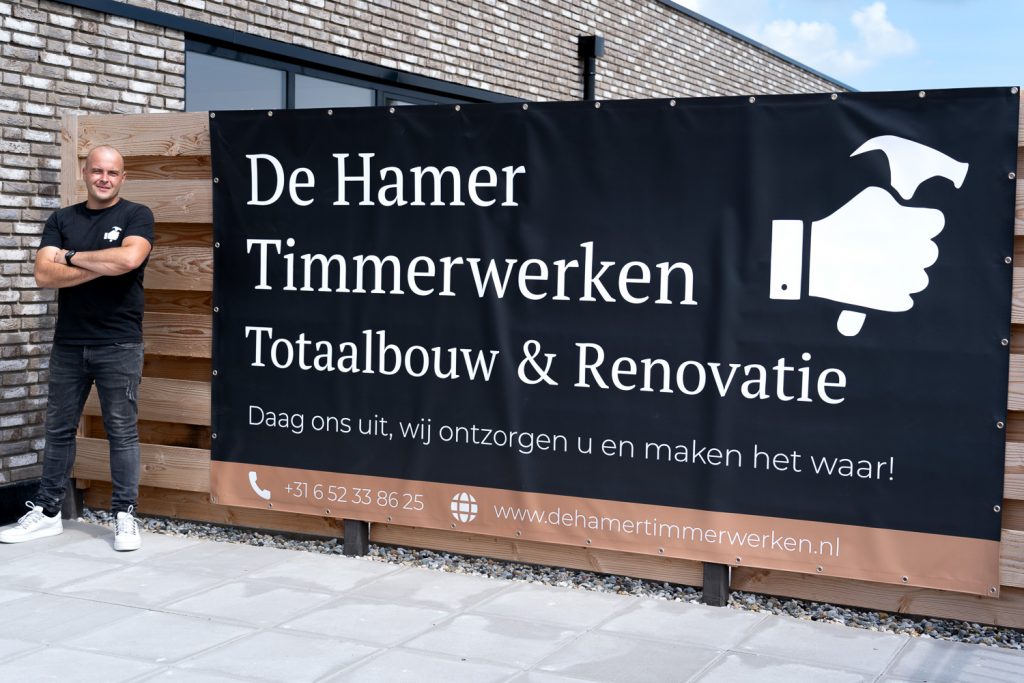 De hamer timmerwerken foto's klein